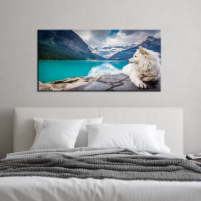 A White Dog Sitting On A Rock Canvas Wall Painting